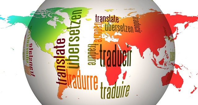 An illustration of the globe, with the word translate written in different languages.